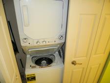 Stackable washer and dryer in the unit
